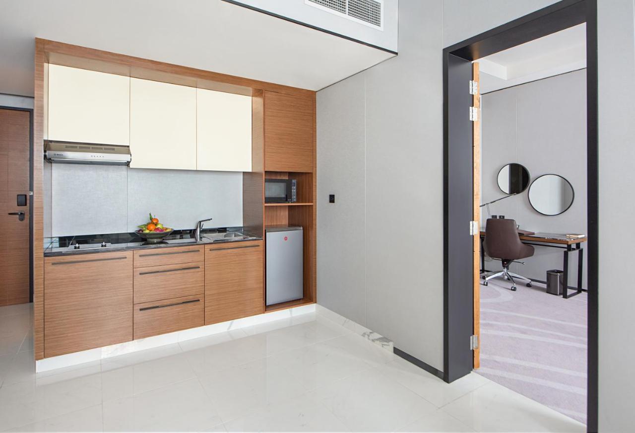 Asiana Grand Hotel Dubai Exterior foto A kitchenette in a hotel